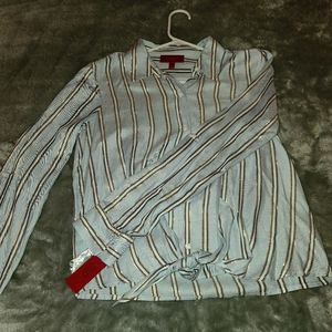 Jennifer Lopez button up shirt. Size Small. Blue, white, black, and gold lining.